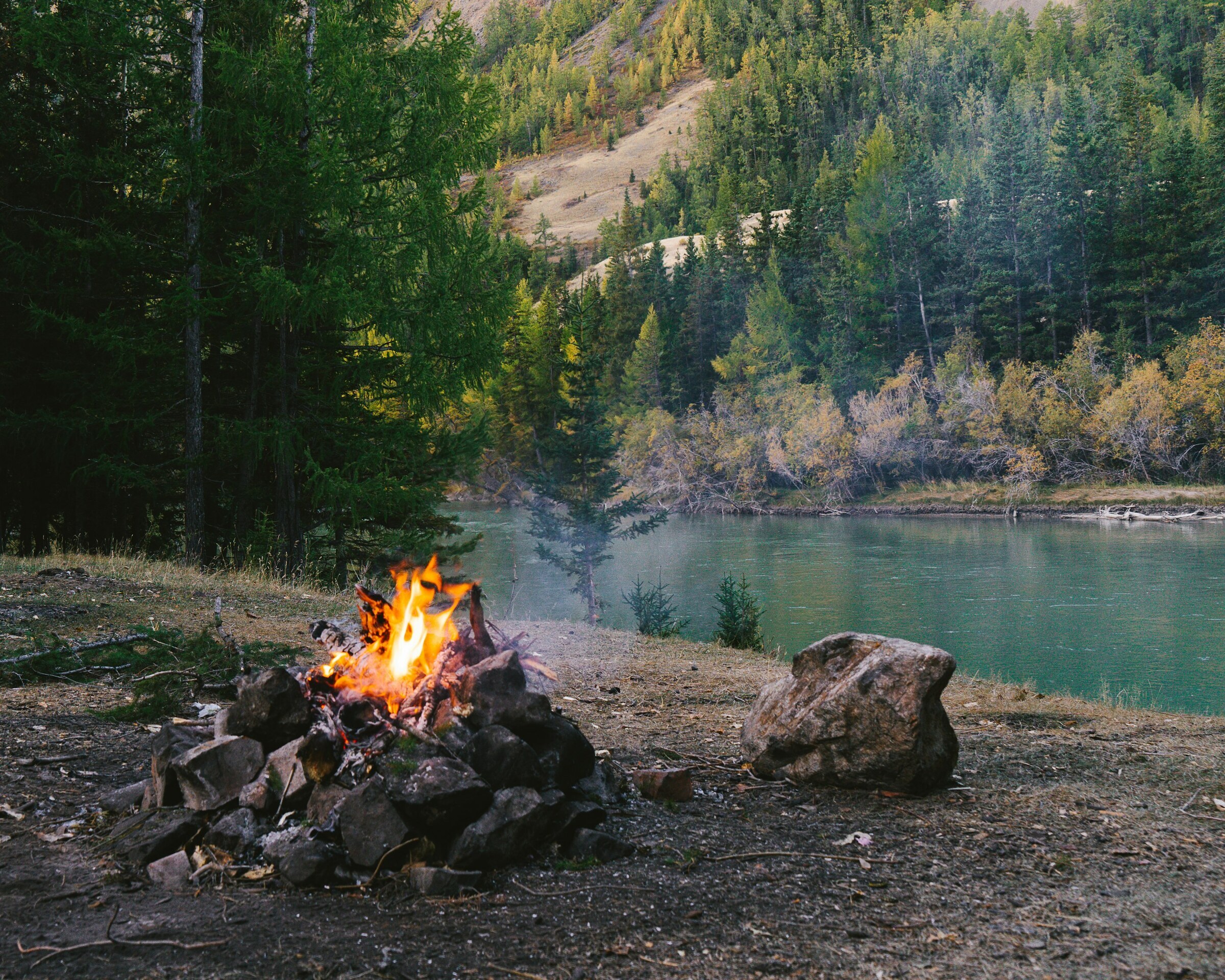 Campfire by a lake